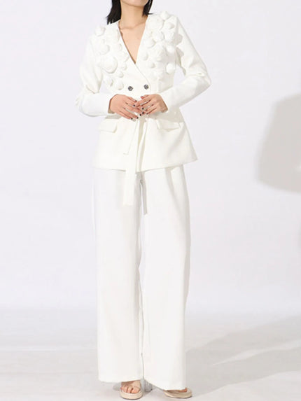 Woman in elegant white blazer pantsuit — old money fashion style guide by Maison Adelaide