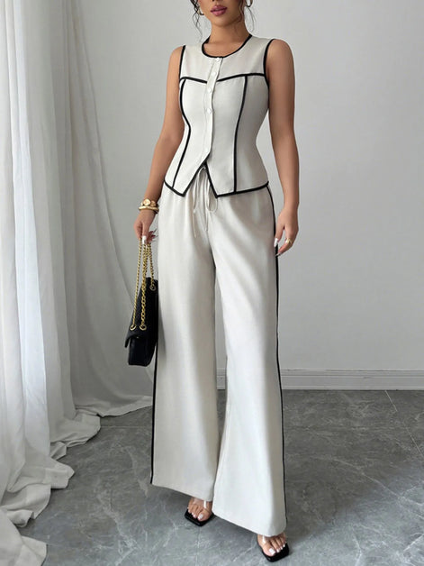 The Zoé Co-Ord Set - peplum top and wide leg trouser set by Maison Adelaide