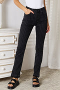 The Inès Striped Trousers - black and white stripe wide leg trousers by Maison Adelaide
